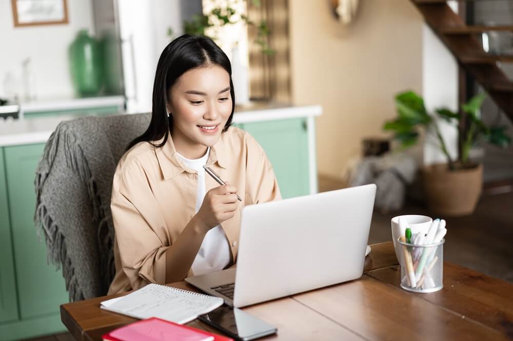 an asian girl is studying igcse with ignite a star.