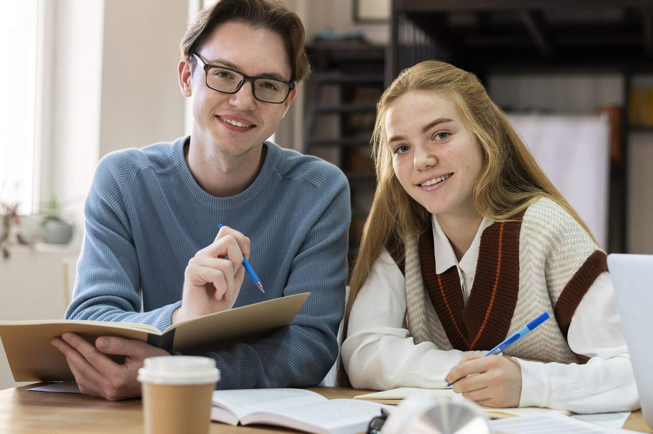 a teacher and a student atr studying on an important international curricula subject at Ignite A*, the premium tutoring school for international students in Thailand.